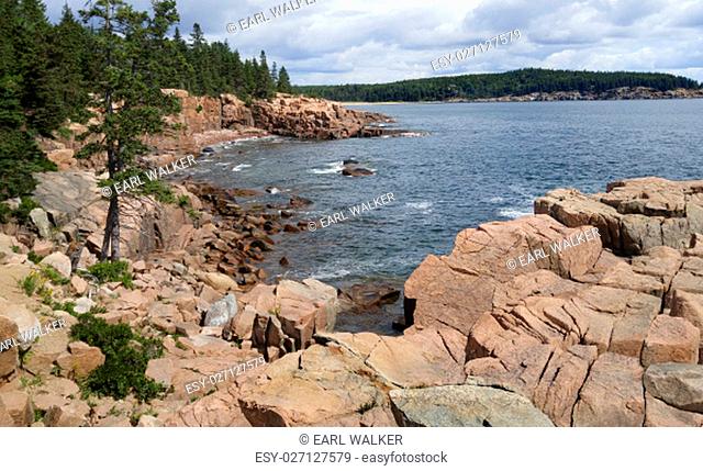 Sheer cliffs and large granite boulders form the shoreline of Mount Desert Island in Acadia National Park