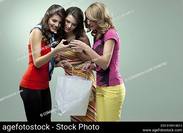 young women smiling high heels shopping