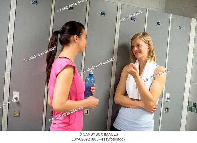 Sport women talking in locker room