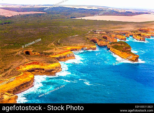 Great Ocean Road and the Twelve Apostles - group of limestone cliffs on Pacific coast. Australia. Scenic coastline. The concept of extreme