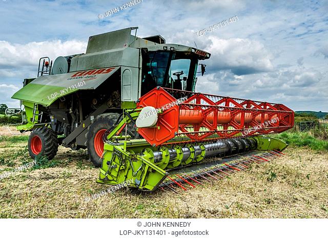 England, Leicestershire, Market Harborough. A Claas combine ready for harvesting