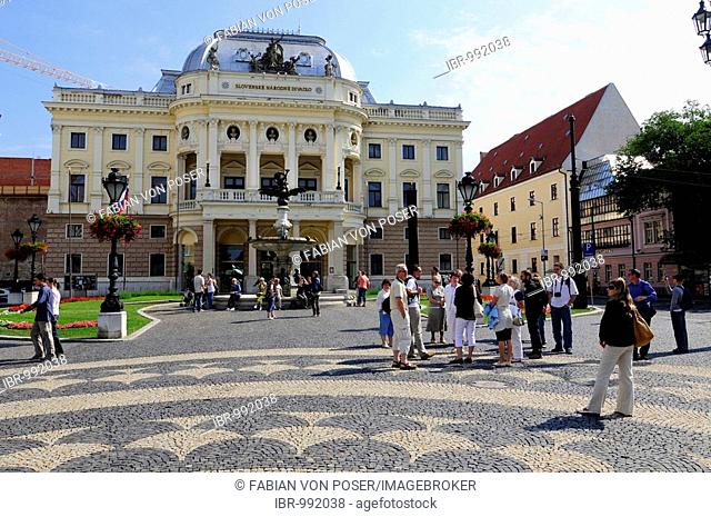 Tourists in front of the Slovak National Theatre, Slovenske narodne divadlo, Bratislava, formerly known as Pressburg, Slovakia, Europe