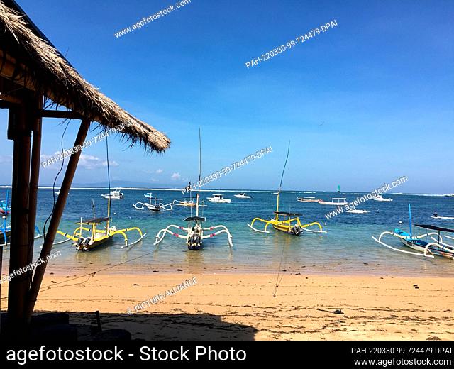 15 June 2019, Indonesia, Ubud, Kuta, Sanur: Fishing boats on the beach of Sanur on the Indo-European island of Bali. Tourists are once again drawn to Southeast...