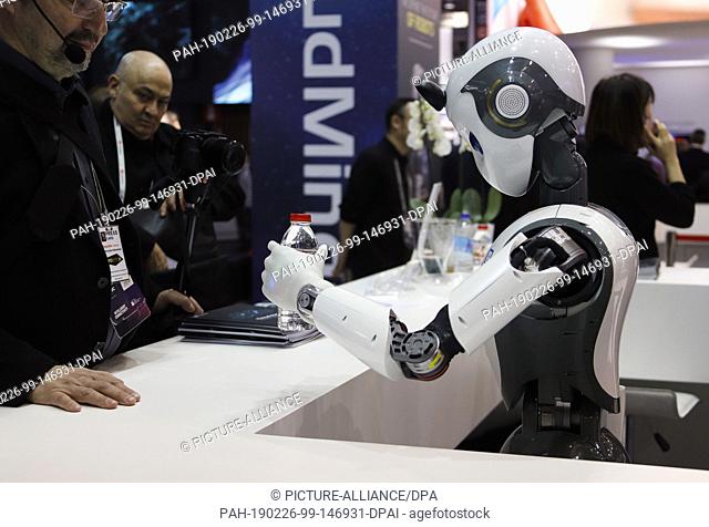 26 February 2019, Spain, Barcelona: A robot is waiting in wait at the Mobile World Congress 2019 in Barcelona. MWC runs from 25 to 28 February