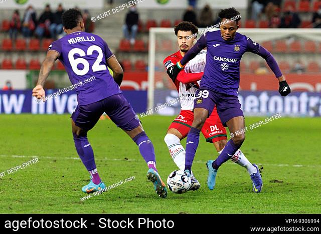 Anderlecht's Amir Murillo, Essevee's Cameron Humphreys and Anderlecht's Christian Kouame fight for the ball during a soccer match between SV Zulte Waregem and...