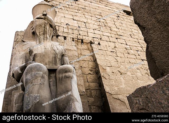Statue of Ramses II in front of first pylon of Luxor Temple, Luxor, Luxor Governorate, Egypt, Africa, Middle East