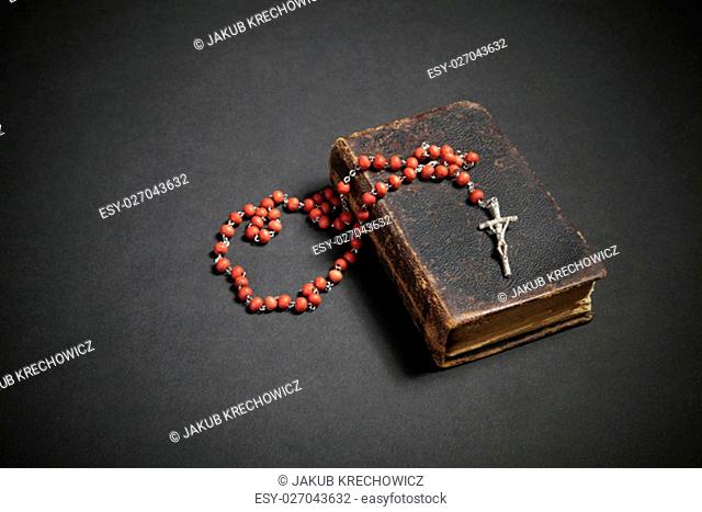 Rosary on the old Bible