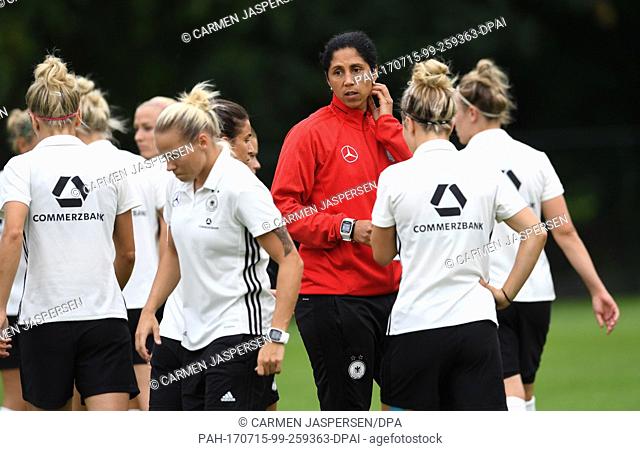 German national coach Steffi Jones gestures during a training session for the UEFA Women's Euro soccer championships in Sint-Michielgestel, Netherlands
