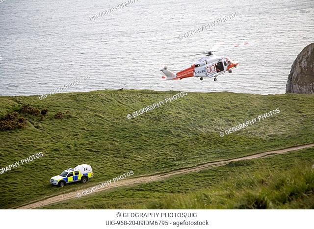Coastguard cliff rescue near Durdle Door, Dorset, England