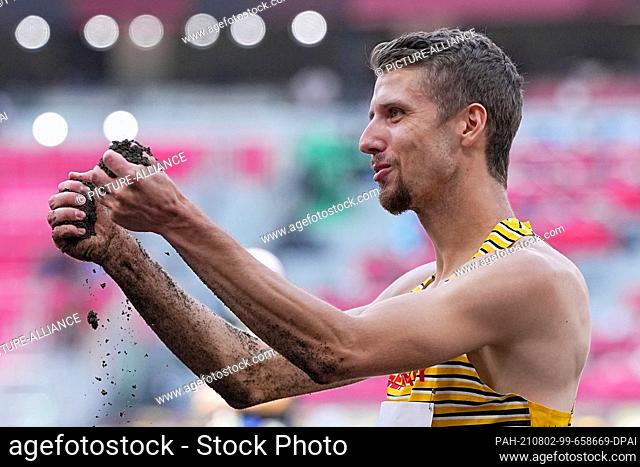 02 August 2021, Japan, Tokio: Athletics: Olympics, long jump, men, final, at the Olympic Stadium. Fabian Heinle from Germany in action