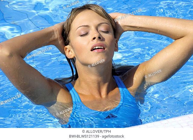 woman in bathing suite in the pool