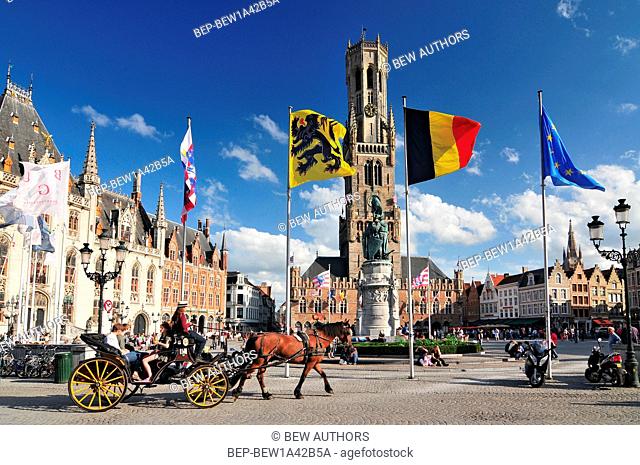 The historic belfry and city center square in the old medieval old town of Bruges (Brugge) Belgium