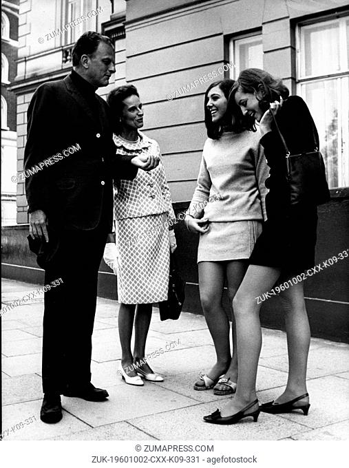 June 17, 1967 - London, England, U.K. - Reverend BILLY GRAHAM and his wife RUTH chatting with two girls, MARGOT-VIDA STOTT and OLIVIA JANE HADLEY in Kensington