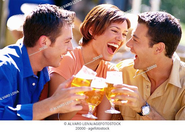 Young people drinking beer