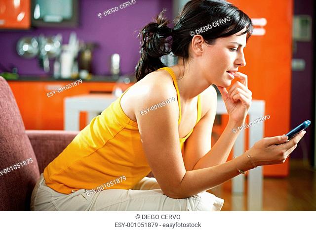 woman having bad news on mobile phone