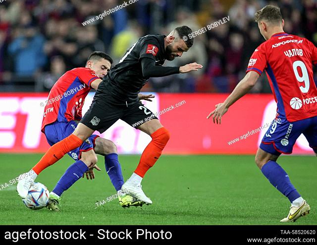 RUSSIA, MOSCOW - APRIL 19, 2023: Ural's Rai Vloet (C), CSKA's Sasa Zdjelar (L) and Fyodor Chalov fight for the ball in Leg 1 of the 2022/2023 Russian Cup's RPL...
