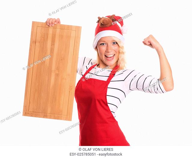 woman with santa hat holding a wooden board as advertising space