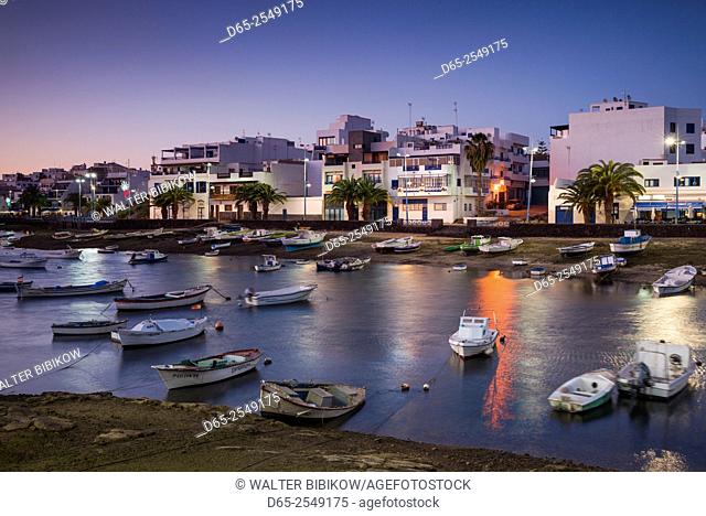 Spain, Canary Islands, Lanzarote, Arecife, Charco de San Gines, fishing boats, dusk