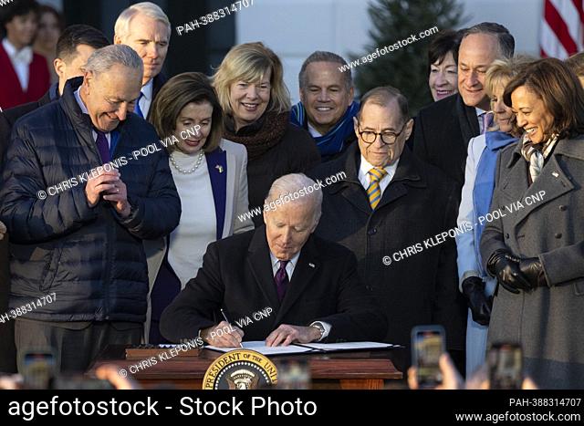 United States President Joe Biden signs the Respect for Marriage Act on the South Lawn of the White House in Washington, DC on Tuesday, December 13, 2022
