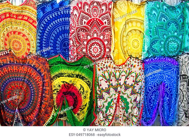 Bright colourful multicolored Middle Eastern, Arabian, Turkish, mediterranean oriental traditional babushka shawls, rugs and kerchiefs