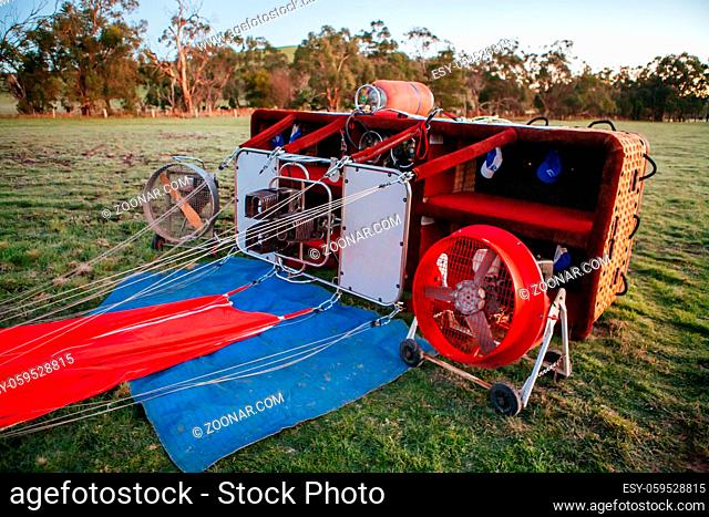 A hot air balloon being setup on a cold winter's morning in Yarra Valley, Victoria, Australia