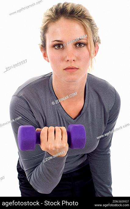 A young woman with dumbbells. Active sporty life, wellness - isolated over a white background