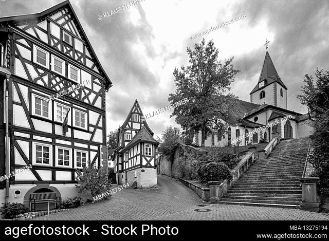 Smallest house, half-timbered house, St. Martin's Church, church staircase, Kirchgasse, old town, Bad Orb, Main-Kinzig-Kreis, Hessen, Germany, Europe