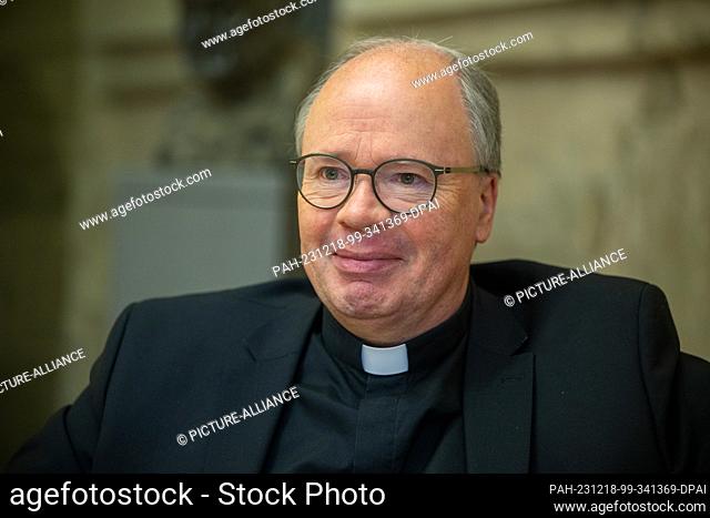 PRODUCTION - 14 December 2023, Rhineland-Palatinate, Trier: The Bishop of Trier, Stephan Ackermann, talks about the upheaval in the Catholic Church in an...