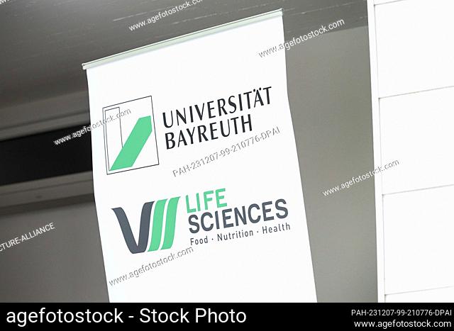 04 December 2023, Bavaria, Kulmbach: Logo of the University of Bayreuth. Opening of the Live-In-Lab for holistic research into human health with the help of...