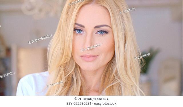 Portrait of Pretty Woman with long Blond Hair