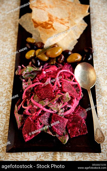 Beet and Sumac Salad with Flat Bread and Olives
