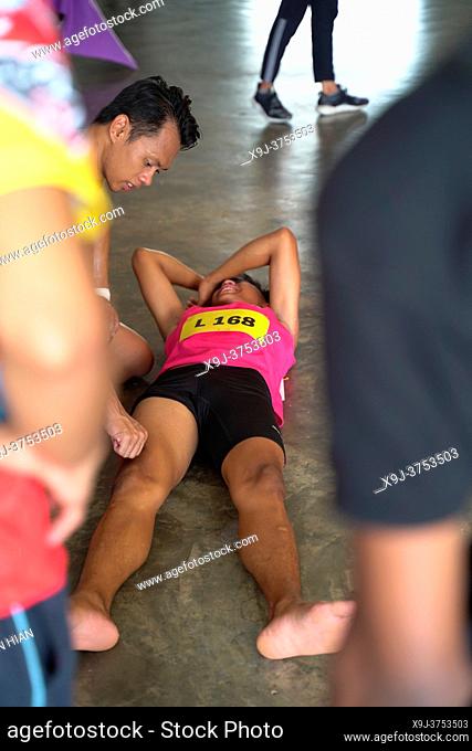Injured runner lying on the floor