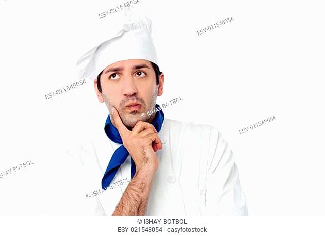 Male chef lost in deep thoughts