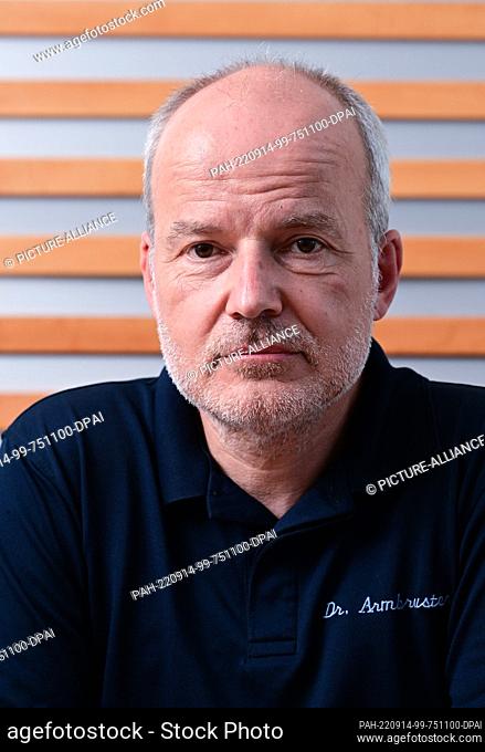 PRODUCTION - 08 August 2022, Baden-Wuerttemberg, Kornwestheim: Urologist Marc Armbruster, photographed in his urology practice
