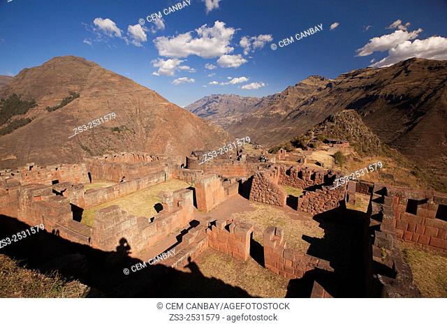 Tourists near the Inca terraces of the ancient Inca settlement, Pisac Ruins , Cusco Region, Peru, South America