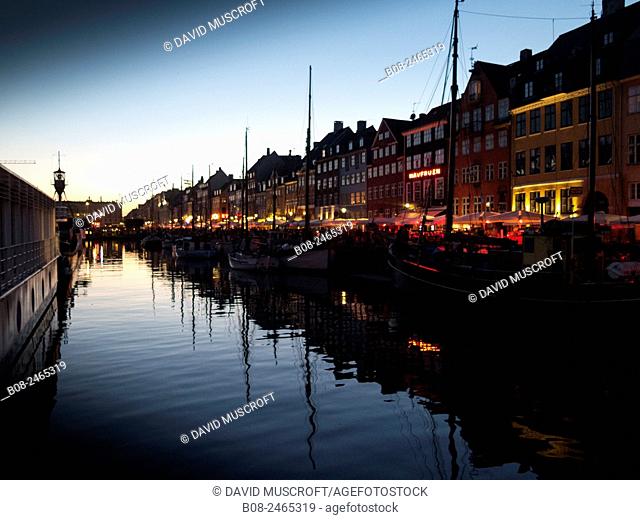 Yachts and traditional boats in the Nyhavn harbour area, Copenhagen, Denmark