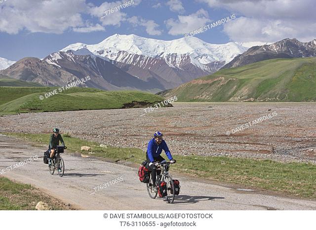 Bicyclists completing a ride of the Pamir Highway, Kygyzstan