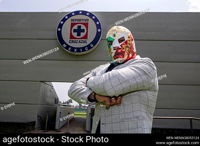 Wrestler Dr Wagner poses for photographs before a press conference at La Noria, high performance Center of the Cruz Azul football team on August 4 2021 in...