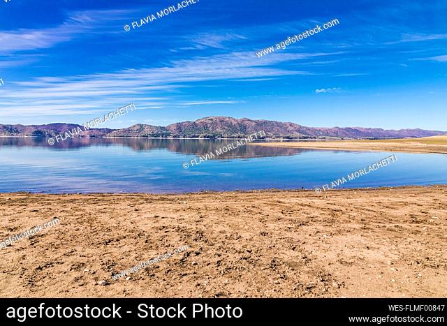 Argentina, Cordoba Province, Potrero de Garay, Shore of Los Molinos Lake with hills in background