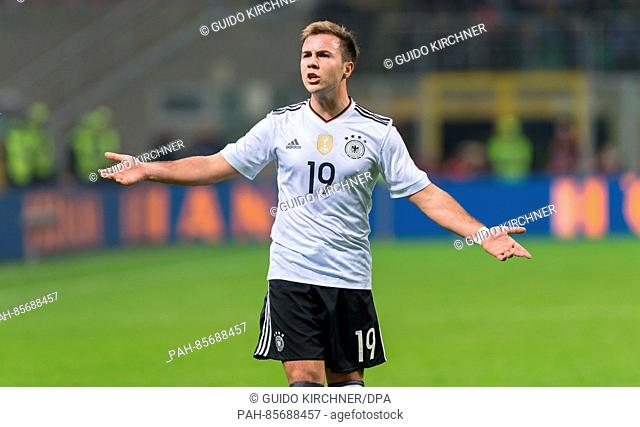 Germany's Mario Goetze gestures during the international soccer match between Italy and Germany in the Stadio Giuseppe Meazza in Milan, Italy, 15 November 2016