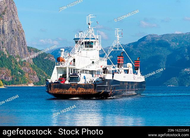 OANES, NORWAY - JULY 25, 2018: Ferry boat from Lauvvik approaching. It is a very popular crossing for tourists who want to climb the preikestolen