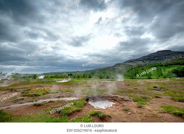Geysir smoking, touristic atraction in Iceland, June
