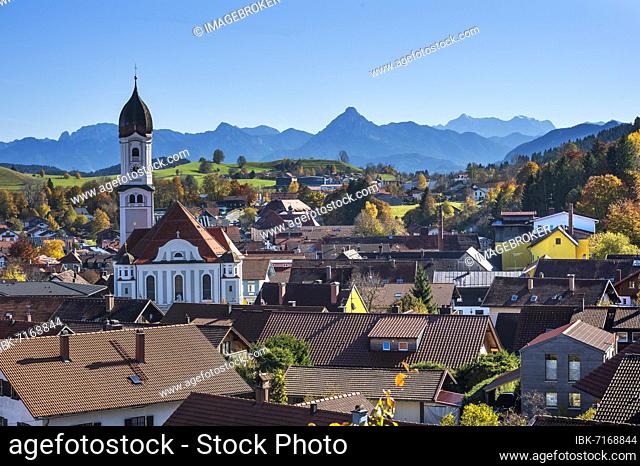 View of Nesselwang with St. Andreas, Catholic parish church, on the right the Zugspitze massif, on the left the Säuling, Bavaria, Germany, Europe