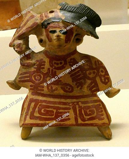 Pottery vessel with ritual impersonator wearing a bee costume, Classic Veracruz, AD 900-1200. Classic Veracruz culture (or Gulf Coast Classic culture) refers to...