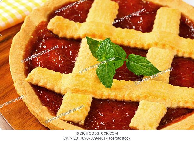 strawberry jam tart with lattice on top