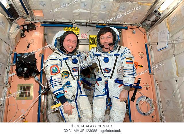 NASA astronaut Michael Fincke (left), Expedition 18 commander; and cosmonaut Yury Lonchakov, flight engineer, attired in their Russian Sokol flight suits