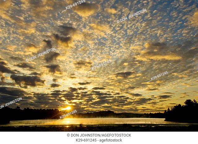 Sunrise skies over Anderson Lake, Ontario, Canada