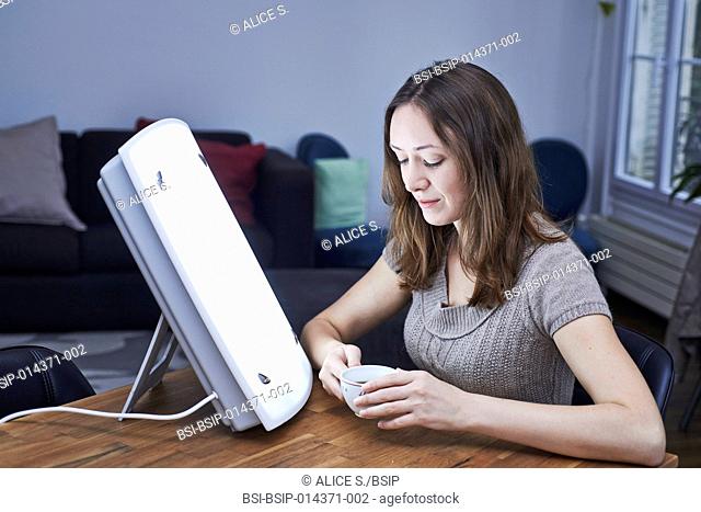 woman doing a light therapy session