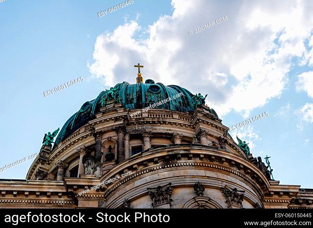Low angle view of the dome of Berlin Cathedral, Berliner Dom, against blue sky with clouds