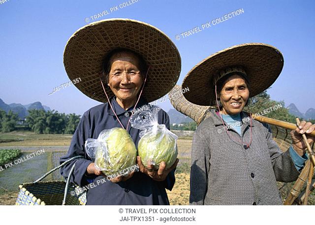 Local Women with Pomelos & Traditional Fishing Basket, Guilin / Yangshou, Guangxi Province, China